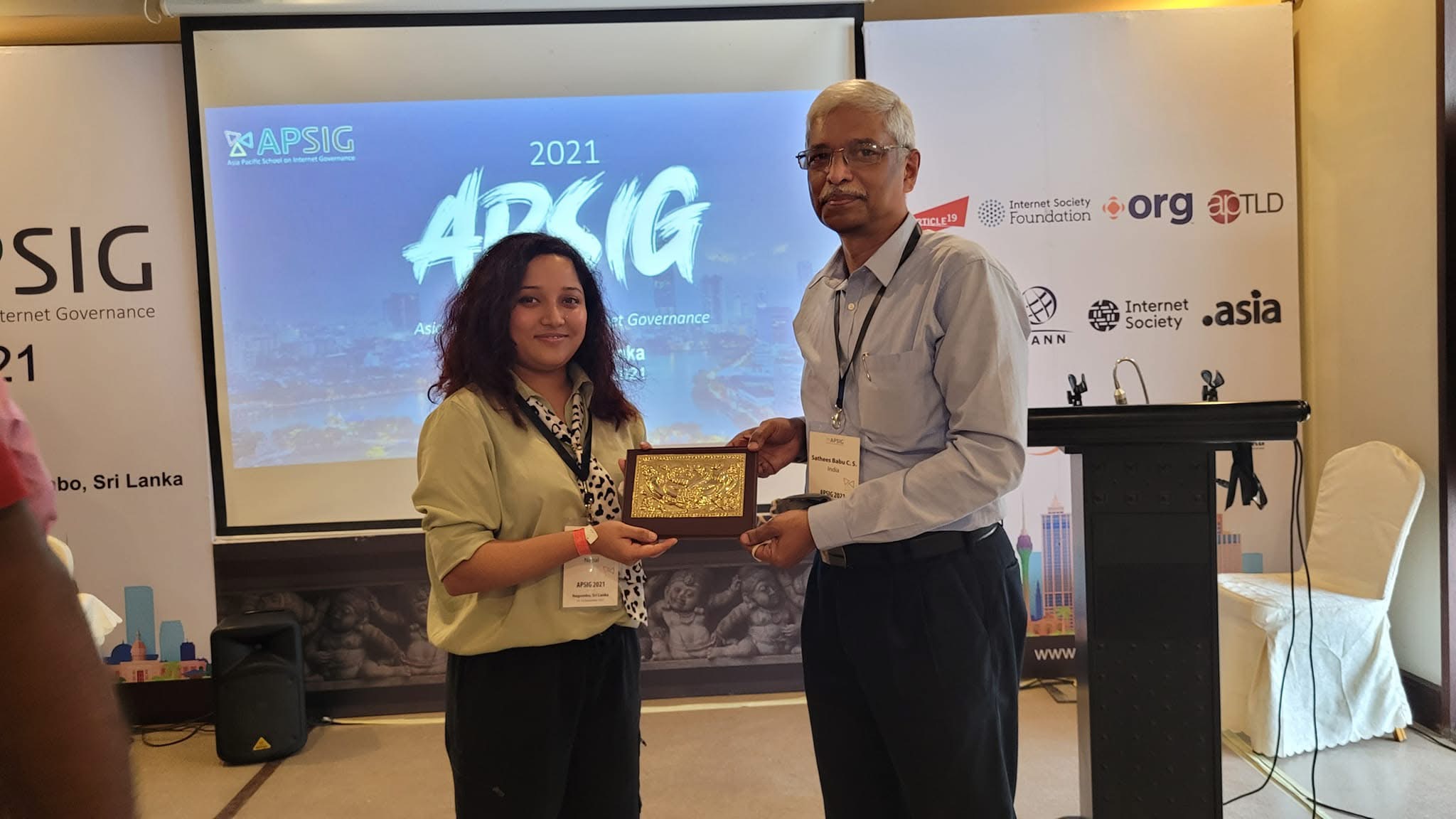 Receiving award at APSIG
